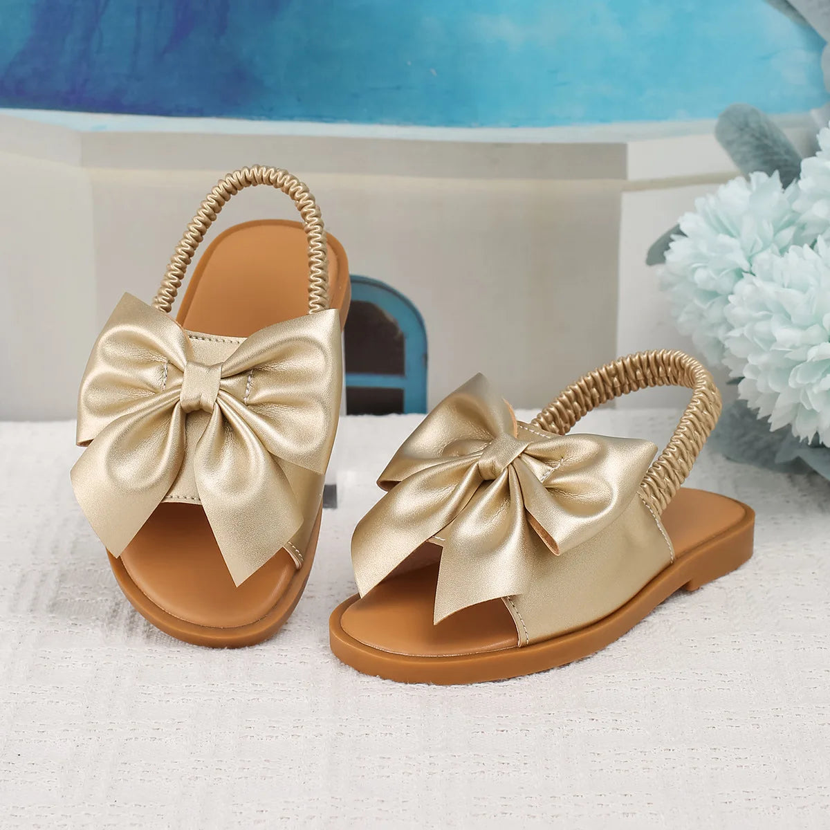 Children's sandals summer new hollow out walking shoes flat sandals cross-border hot selling butterfly knot elastic band sandals