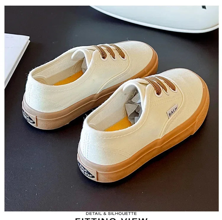 Children's Slip-On Canvas Shoes – Breathable, Solid Color Casual Footwear with Thick Soft Sole and Flat Bottom for Outdoor Wear