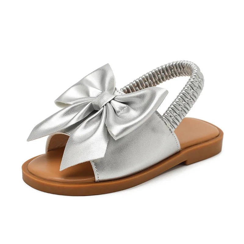 Children's sandals summer new hollow out walking shoes flat sandals cross-border hot selling butterfly knot elastic band sandals