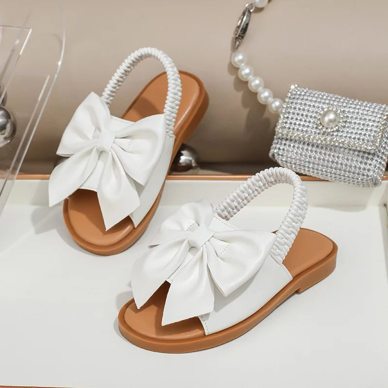Children's sandals summer new hollow out walking shoes flat sandals cross-border hot selling butterfly knot elastic band sandals