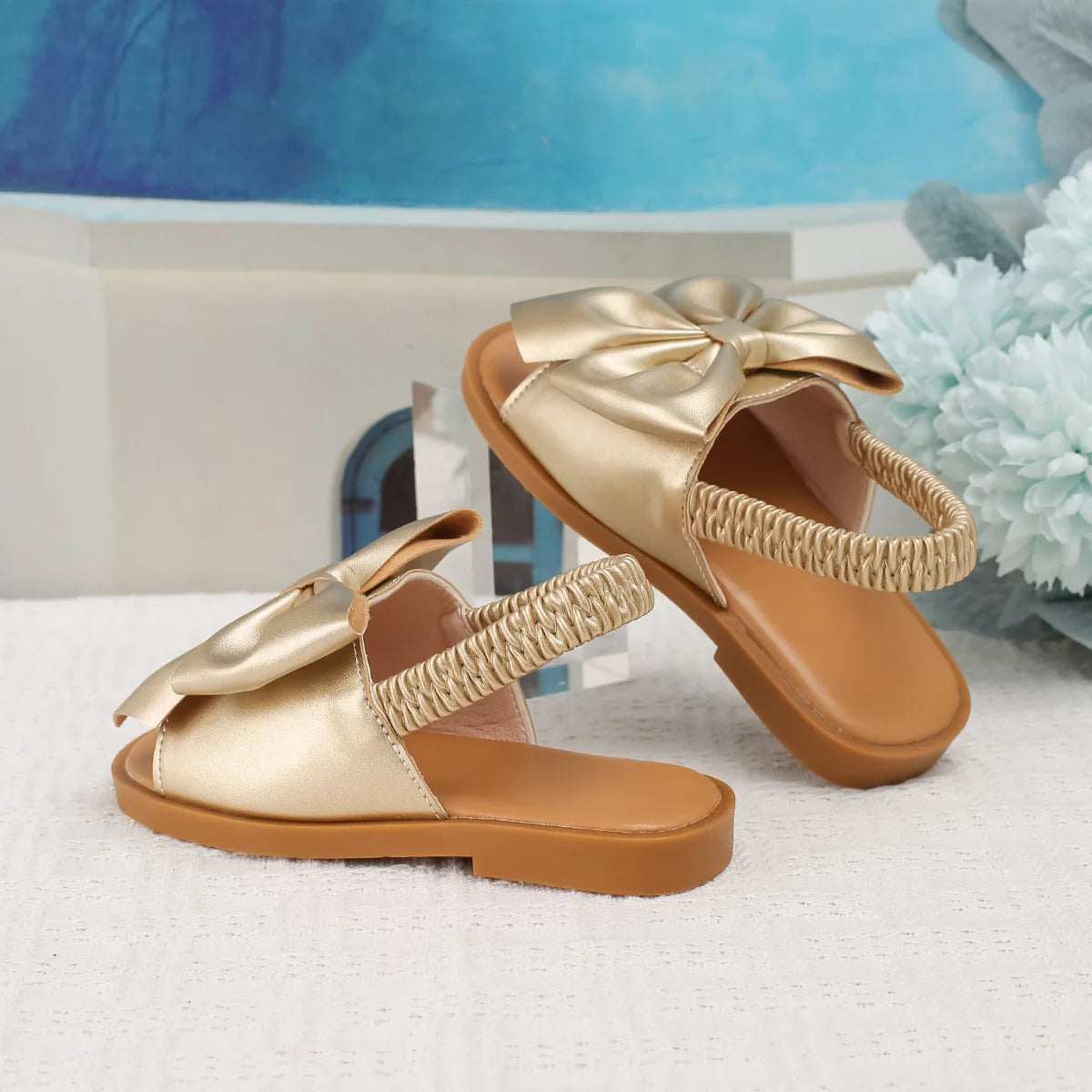 Children's sandals summer new hollow out walking shoes flat sandals cross-border hot selling butterfly knot elastic band sandals